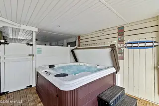 3617 W Pelican Drive, Oak Island, NC 28465 – photo 14: 16_hot tub