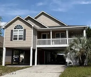 126 NE 5th Street, Oak Island, NC 28465 – photo 1: Front photo of 126 NE 5th St