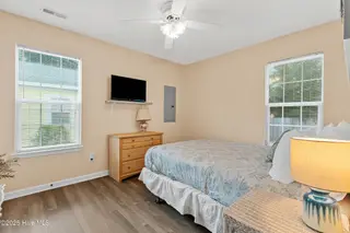 316 NE 52nd Street, Oak Island, NC 28465 – photo 24: 25_bedroom