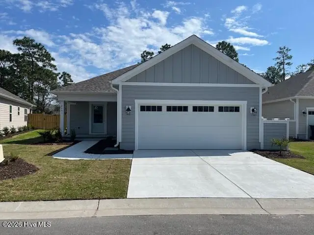 2451 Lake Ridge Drive, Southport, NC 28461 – photo 1 of 8: Front of Home