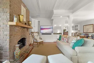 2108 Shepard Street, Morehead City, NC 28557 – photo 16: Stunning brick fireplace in living room