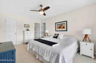1125 S Topsail Drive, Surf City, NC 28445 – photo 17: Primary Suite