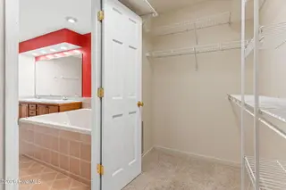 71 Fairway Drive, Shallotte, NC 28470 – photo 24: Walk-in closet