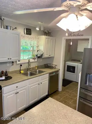 1419 Tom Sessions Road, Whiteville, NC 28472 – photo 6: 1B73AA94-4BA0-428F-9643-9E1E2223E6BA-IMG