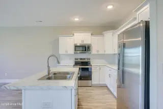 218 Sandpiper Place, Holly Ridge, NC 28445 – photo 11: 218 Sand Piper - Exterior - Edited_9