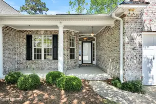 1009 N Sanderling Drive, Leland, NC 28451 — 3-bedroom townhome in Waterford of the Carolinas, Leland, NC, photo 2 of 63: Front Entry