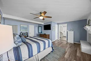 5127 W Beach Drive, Oak Island, NC 28465 – photo 14: 26_bedroom