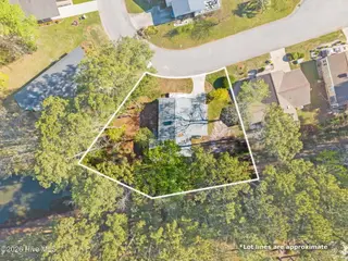 501 Deer Path, Calabash, NC 28467 — 2-bedroom home in Saltaire Village, Calabash, NC, photo 3 of 57: Large Yard