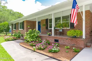116 Holly Road, Pine Knoll Shores, NC 28512 – photo 1: 10-web-or-mls-cchadwick-visuals-116-holl