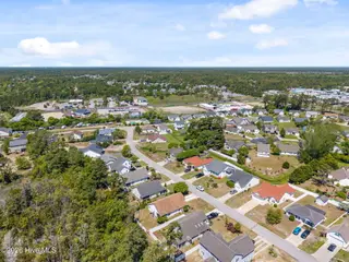 5014 N Hampton Drive SE, Southport, NC 28461 – photo 10: 10-web-or-mls-DJI_20260415124216_0402_D