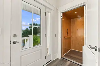 52 Pier View Court, Hampstead, NC 28443 — 3-bedroom waterfront home, Hampstead, NC, photo 5 of 60: 18_front door elevator