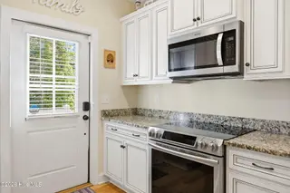 101 NE 33rd Street, Oak Island, NC 28465 – photo 16: Kitchen View 4
