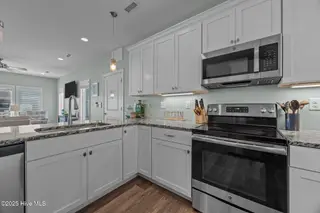 130 N Permuda Wynd Drive, North Topsail Beach, NC 28460 – photo 22: 20250509173220761037000000-o