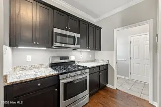 100 Duval Lane, New Bern, NC 28560 – photo 23: 23 - Gas Stove view towards Mud Room