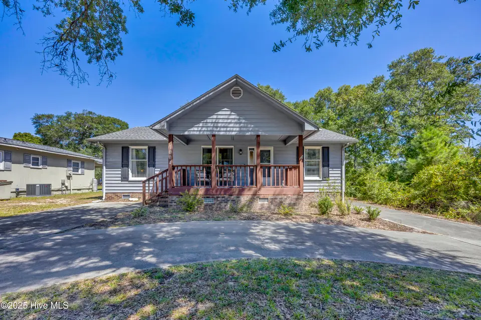 1004 E Oak Island Drive, Oak Island, NC 28465 – photo 1 of 25: 001_img_1110_329