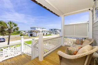 125 Roosevelt Drive, Pine Knoll Shores, NC 28512 — 5-bedroom home in Roosevelt Beach, Pine Knoll Shores, NC, photo 12 of 61: Covered front porch