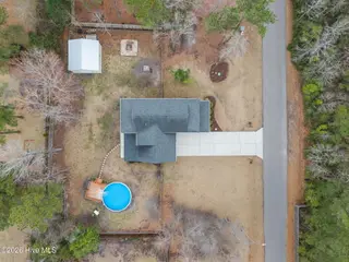 893 Dan Owen Drive, Hampstead, NC 28443 – photo 4: 77-web-or-mls-DJI_20260302113030_0759_D