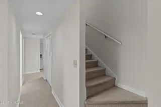 231 Saint Luke Court, Wilmington, NC 28409 — 2-bedroom waterfront townhome in Caneel Cove, Wilmington, NC, photo 3 of 38: 35-web-or-mls-BTS02055