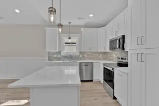 223 NE 75th Street, Oak Island, NC 28465 – photo 9: 223 NE 75th St-19