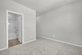 6787 Fellowship Drive, Leland, NC 28451 — 4-bedroom townhome in Grand Park, Leland, NC, photo 24 of 46: Guest Suite