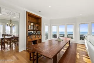 3107 Ocean Drive, Emerald Isle, NC 28594 – photo 13: Open living room w/ fireplace