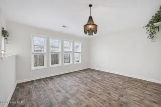 5332 Sun Coast Drive, Wilmington, NC 28411 – photo 6: AI removed furniture and repaint