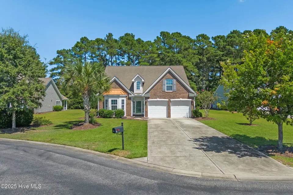 12 Calabash Lakes Boulevard, Carolina Shores, NC 28467 – photo 1 of 41: 12 Calabash Lakes Boulevard