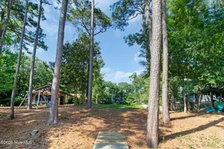117 White Ash Drive, Pine Knoll Shores, NC 28512 – photo 13: View looking back from dock