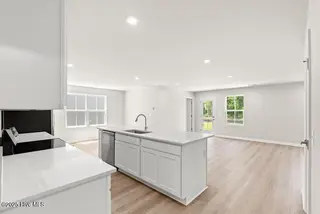 8031 Sterling Oaks Drive NW, Ash, NC 28420 – photo 5: Kitchen Island