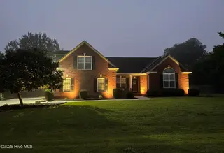 123 Scrub Oaks Drive, Hampstead, NC 28443 – photo 2: Front.EveningLighting