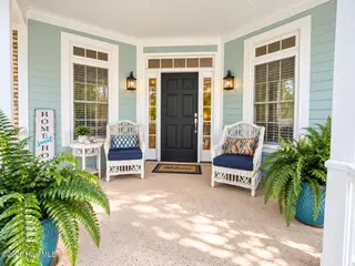 301 Wisteria Way, Caswell Beach, NC 28465 – photo 6: Porch-Close