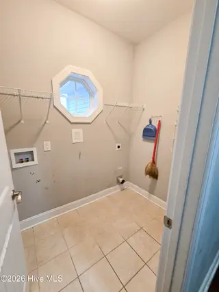 412 Moss Springs Drive, Peletier, NC 28584 – photo 22: laundry