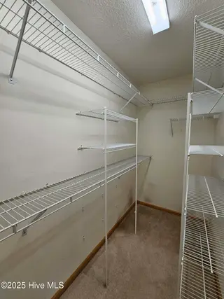 3235 Marsh View Drive SW, Supply, NC 28462 — 3-bedroom home in Lockwood Folly, Supply, NC, photo 15 of 36: Master Closet