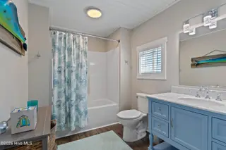316 E Dolphin Drive, Oak Island, NC 28465 – photo 15: 316EDolphinDr - 35