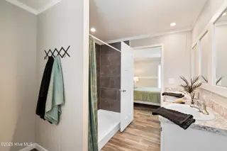 6745 Lewis Drive SE, Winnabow, NC 28479 – photo 20: Master bathroom