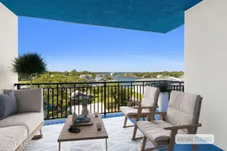 4425 Arendell Street 402 Harborside Club, Morehead City, NC 28557 – photo 2: Spacious Covered Porch