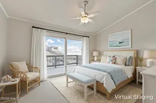 1928 New River Inlet Road 214, North Topsail Beach, NC 28460 – photo 11: Master Bedroom Staged