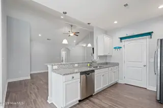 106 NW 19th Street, Oak Island, NC 28465 – photo 14: 34-web-or-mls-DSC01476