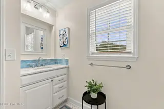 123 Willis Drive, Harkers Island, NC 28531 — 2-bedroom home, Harkers Island, NC, photo 23 of 34: Hall Bathroom