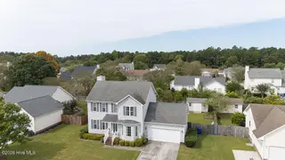 106 Sidney Lane, Jacksonville, NC 28540 — 4-bedroom home in Williamsburg Plantation, Jacksonville, NC, photo 4 of 55: DJI_20261008130318_0006_D