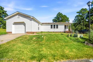 146 Ryder Cup Boulevard, Pinebluff, NC 28373 — 3-bedroom manufactured home in Oakwood Hill, Pinebluff, NC, photo 1 of 43