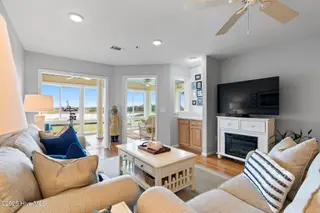 1916 Inlet Village Circle SW Unit 3a, Ocean Isle Beach, NC 28469 — 2-bedroom condo in Inlet Wacche, Ocean Isle Beach, NC, photo 11 of 38: Living room