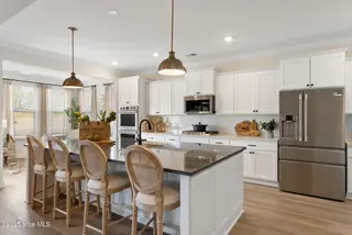 3355 Grand Park Way, Leland, NC 28451 – photo 7: Kitchen - Yates II B - Foxhall Landing
