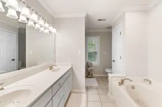 618 Oyster Bay Drive, Sunset Beach, NC 28468 – photo 23: Primary Bath