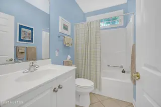 930 Oyster Pointe Drive, Sunset Beach, NC 28468 – photo 16: Guest Bathroom