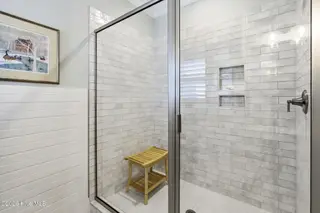 202 NE 64th Street, Oak Island, NC 28465 – photo 23: Spa-like walk-in shower