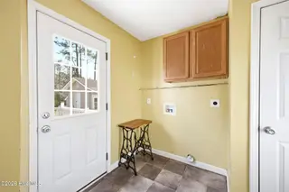 141 Crystal Road, Southport, NC 28461 — 3-bedroom home, Southport, NC, photo 17 of 40: 141 Crystal Rd laundry room