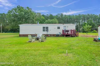 2216 Bell Williams Road, Burgaw, NC 28425 — 3-bedroom manufactured home, Burgaw, NC, photo 15 of 25: Rear Exterior – Spacious Yard