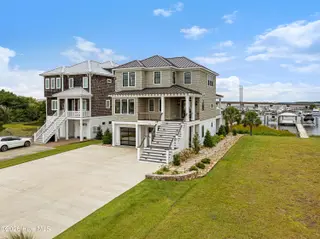 216 Radio Island Road, Morehead City, NC 28557 — 4-bedroom home in Tide Lines, Morehead City, NC, photo 2 of 56: Waterfront Custom Home w/ Dock