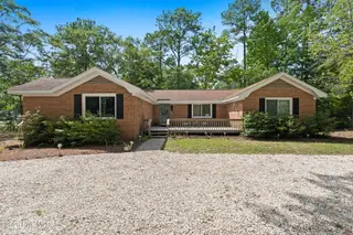 1 Golfview Court, Carolina Shores, NC 28467 — 3-bedroom home in Carolina Shores, Carolina Shores, NC, photo 1 of 34
